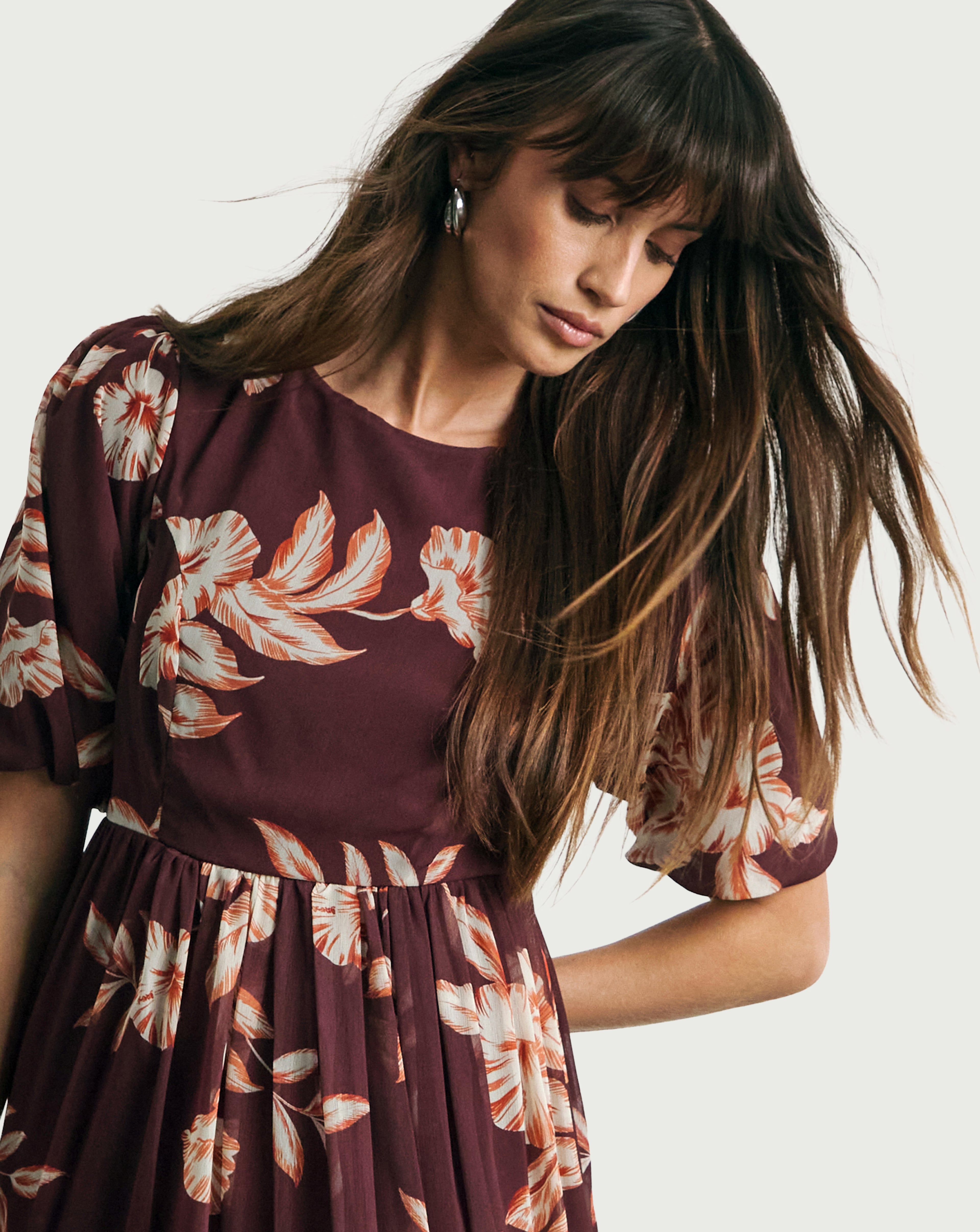 Model wearing the Joanna Hope Lace Back Midi Dress