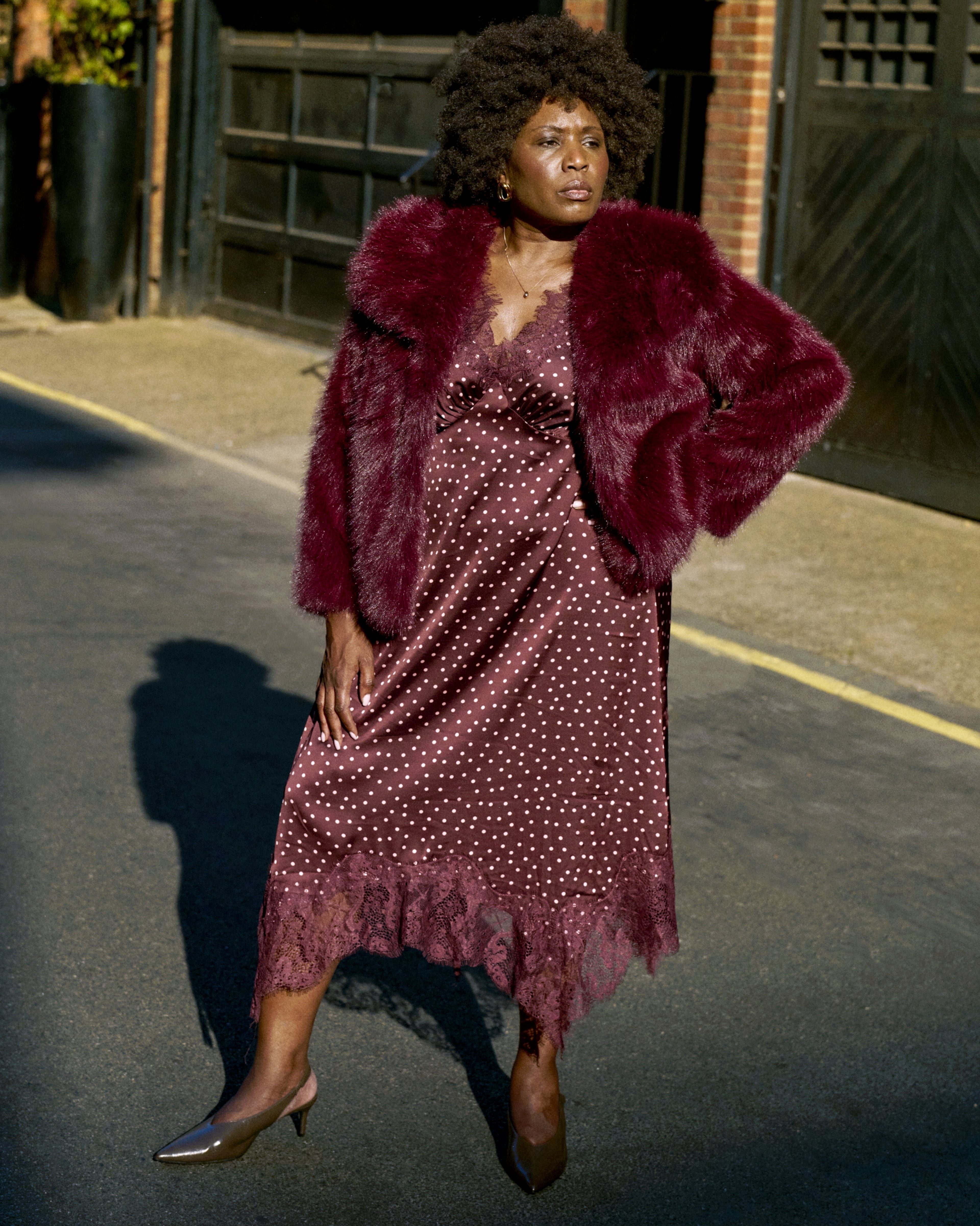 Woman wearing burgundy dress