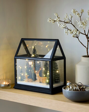 Lit Glass House with Reindeer Scene