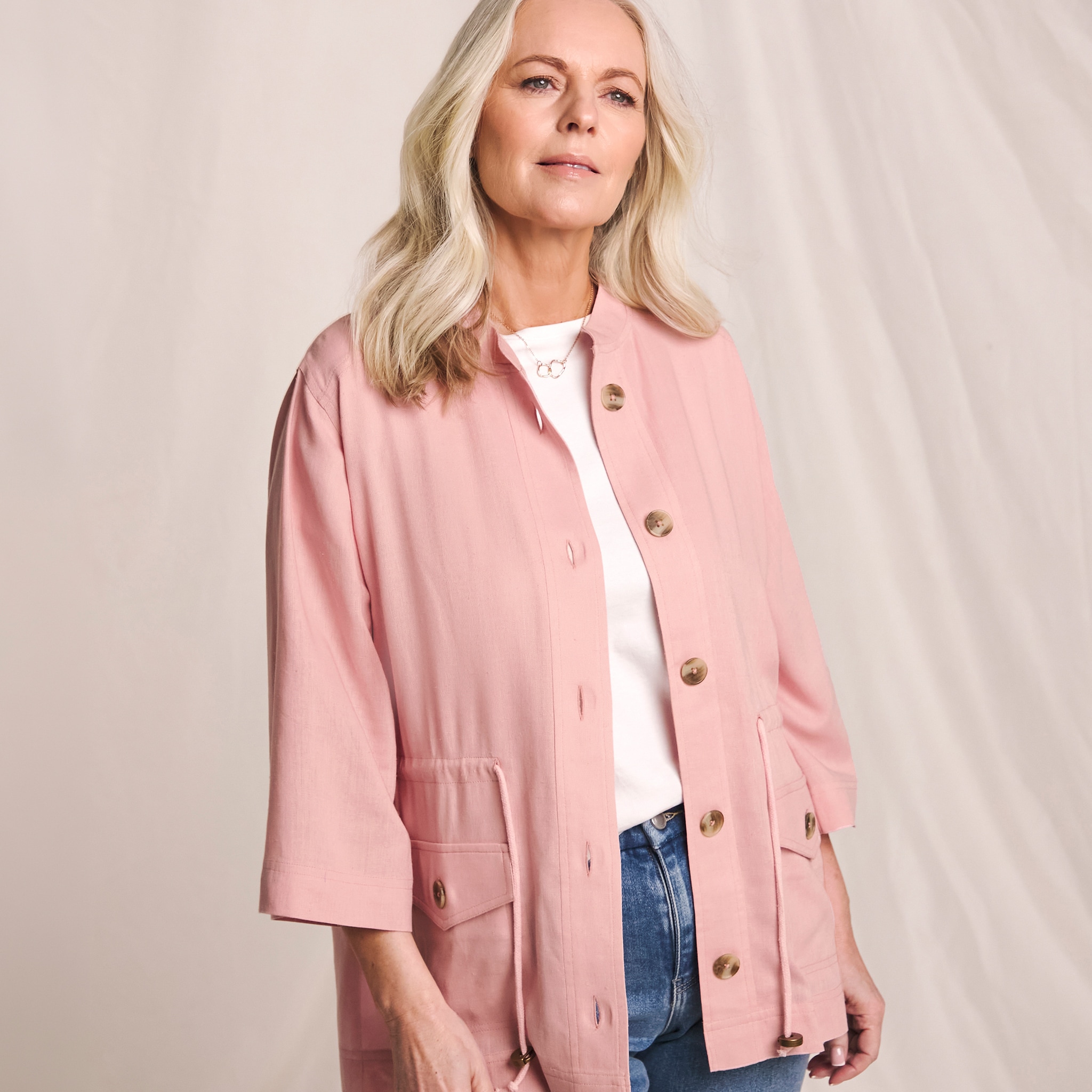 Woman wearing Julipa pink linen overshirt