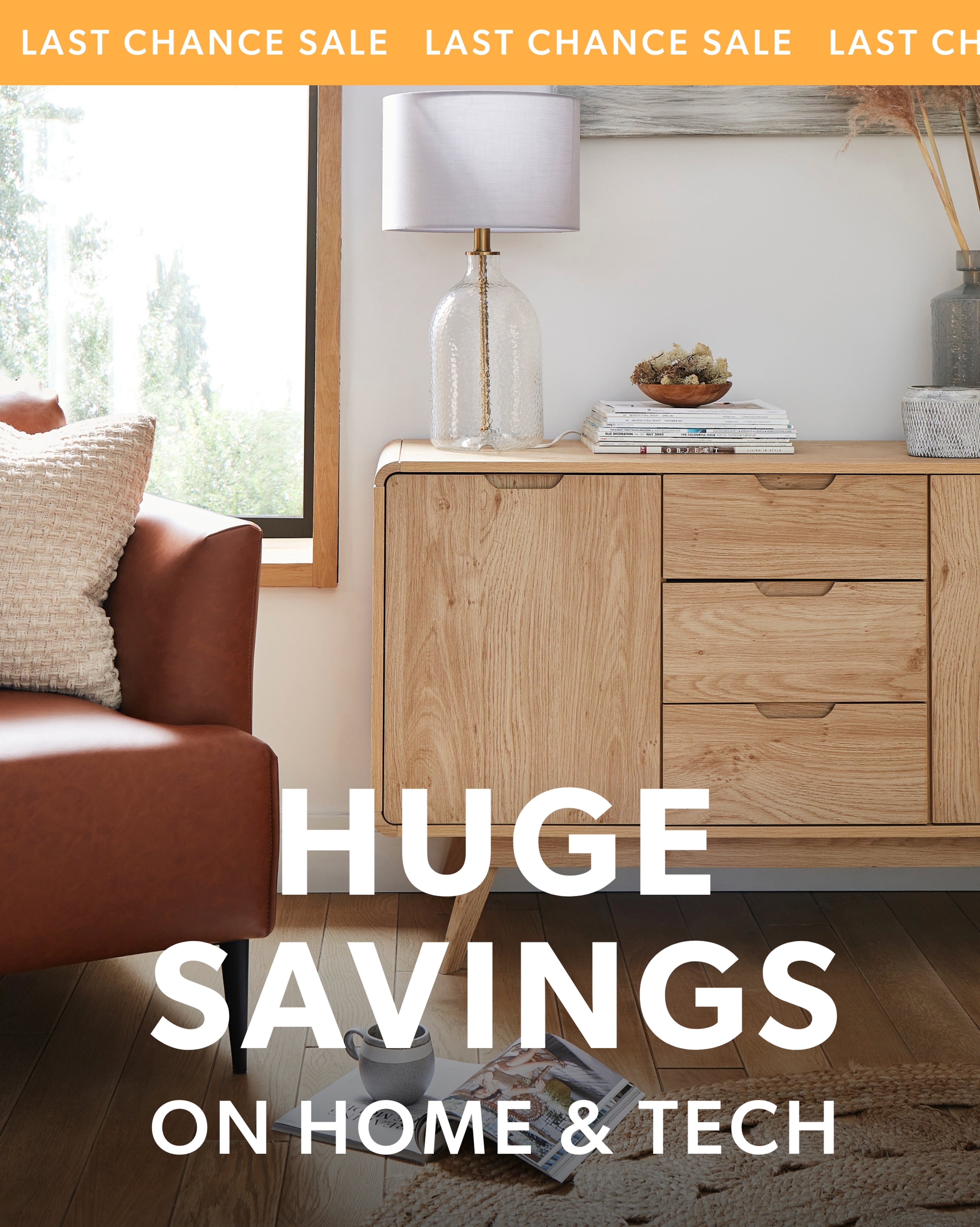 Home and tech promotion showing a wooden sideboard and lamp. 