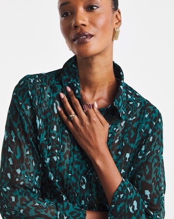 Blue Animal Print Pintuck Peplum Hem Georgette Shirt