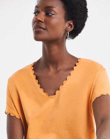Orange Scallop V Neck Bubble Hem Top