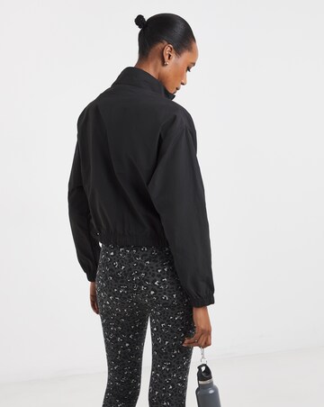 PUMA Her Relaxed Woven 1/2 Zip Crew