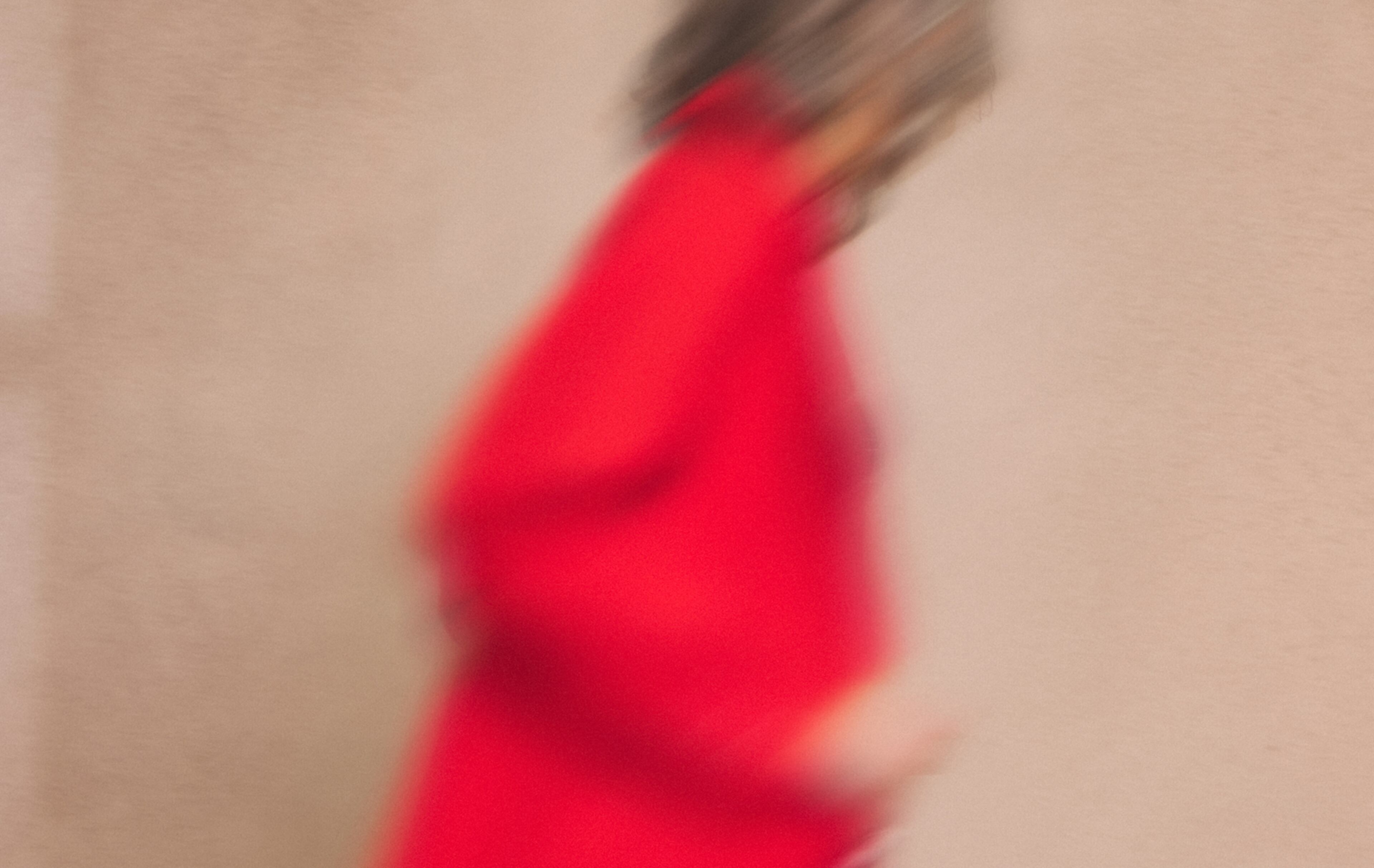 Woman in red jacket
