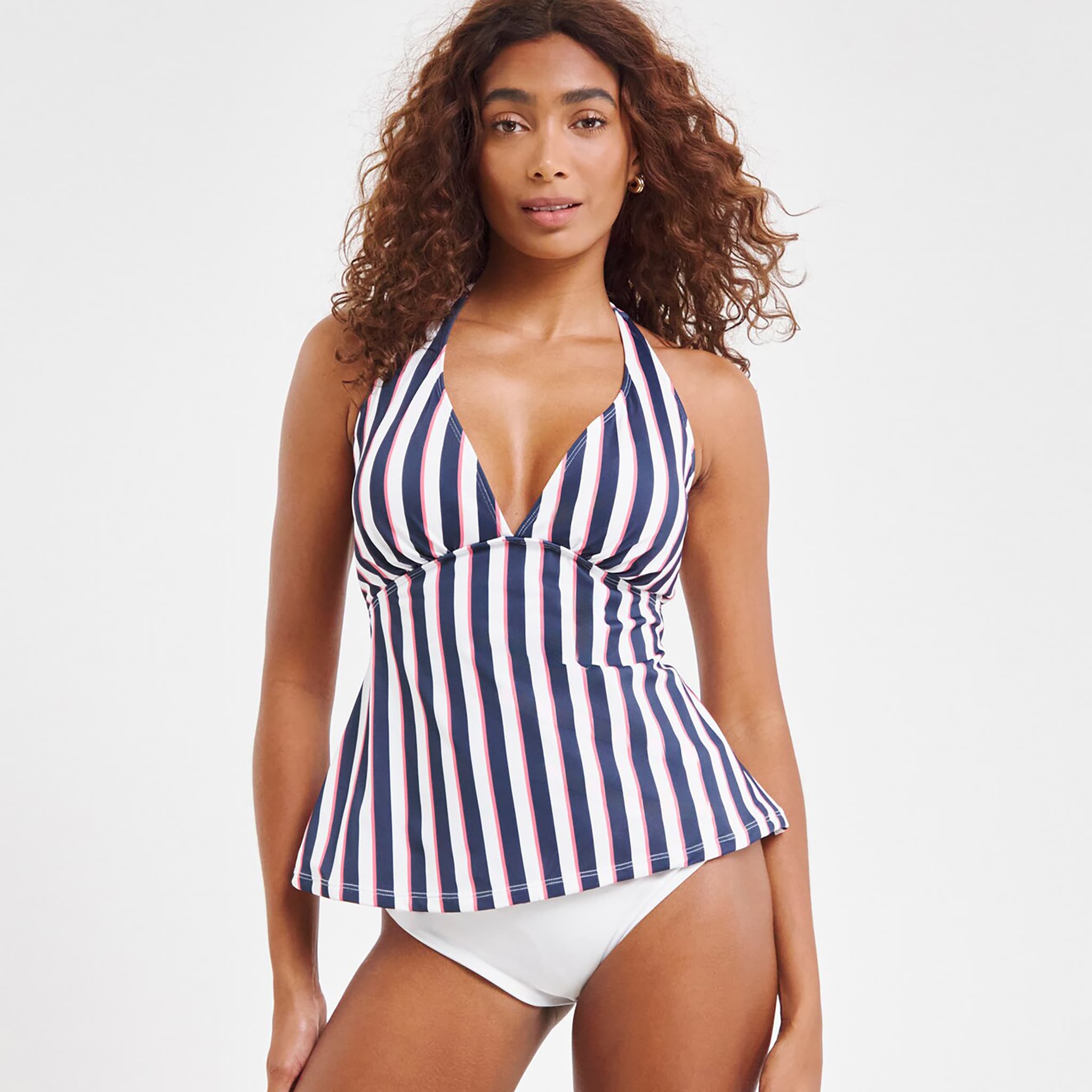A model wearing a blue and white striped tankini