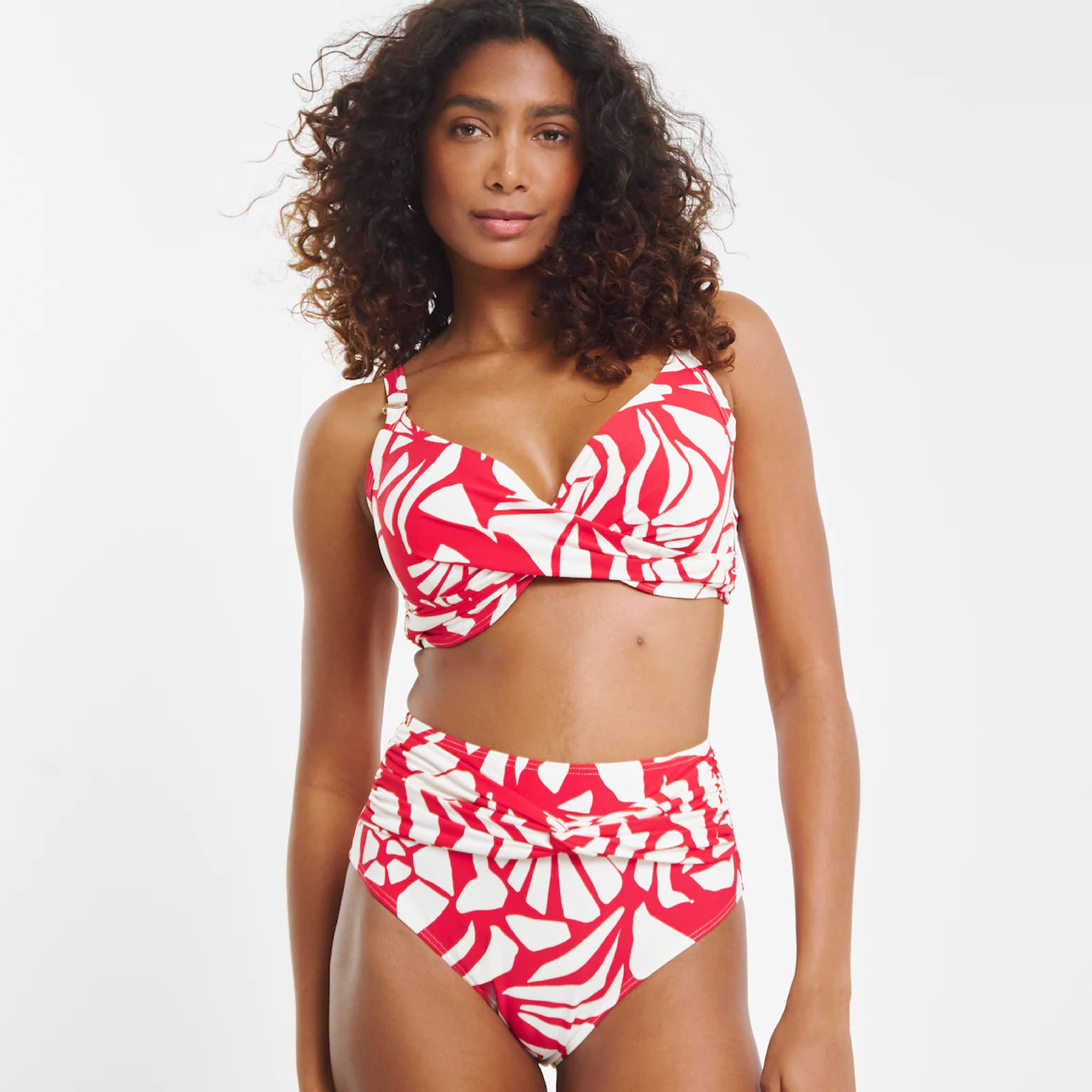 A model wearing a red and white bikini