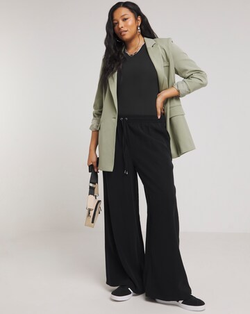 MAGISCULPT Light Control Smoothing T-Shirt Bodysuit