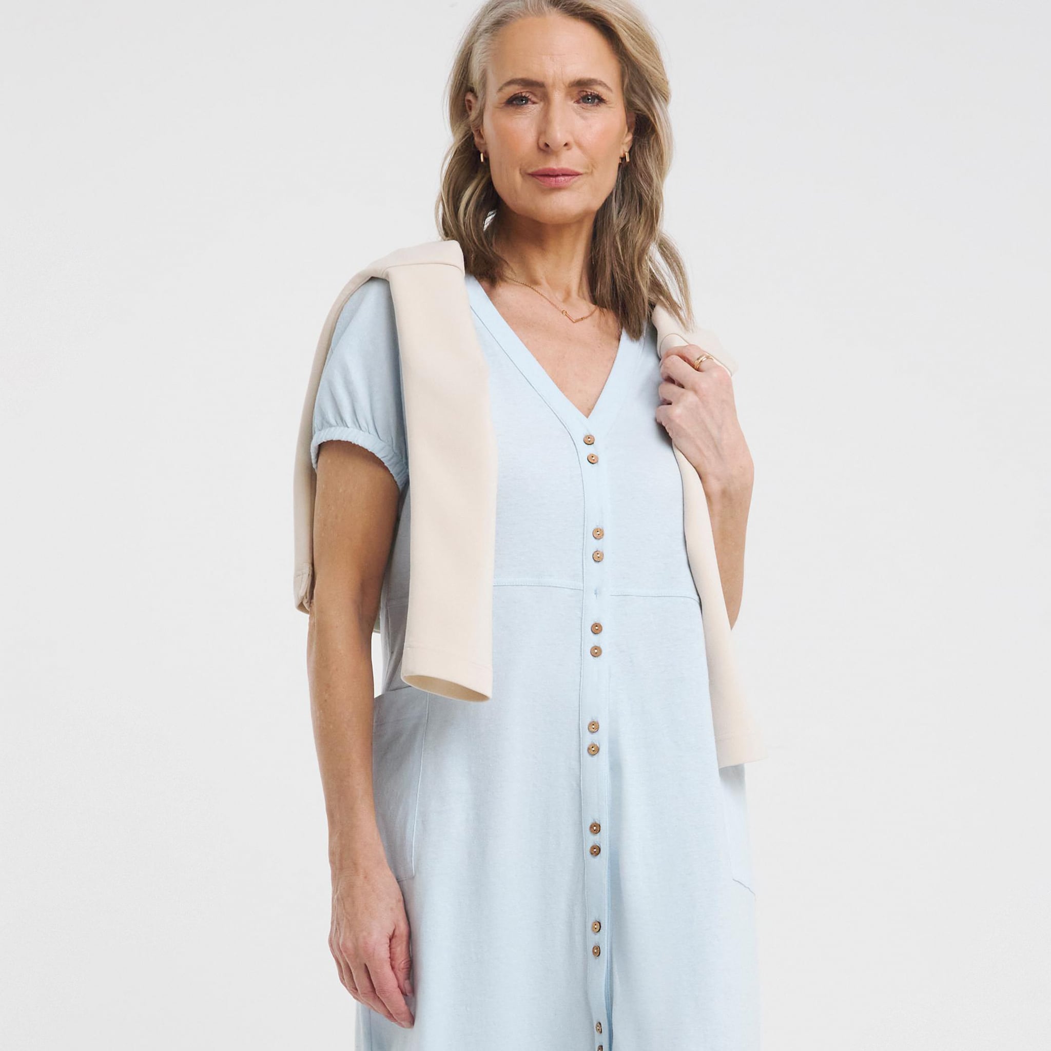 woman in pale blue dress