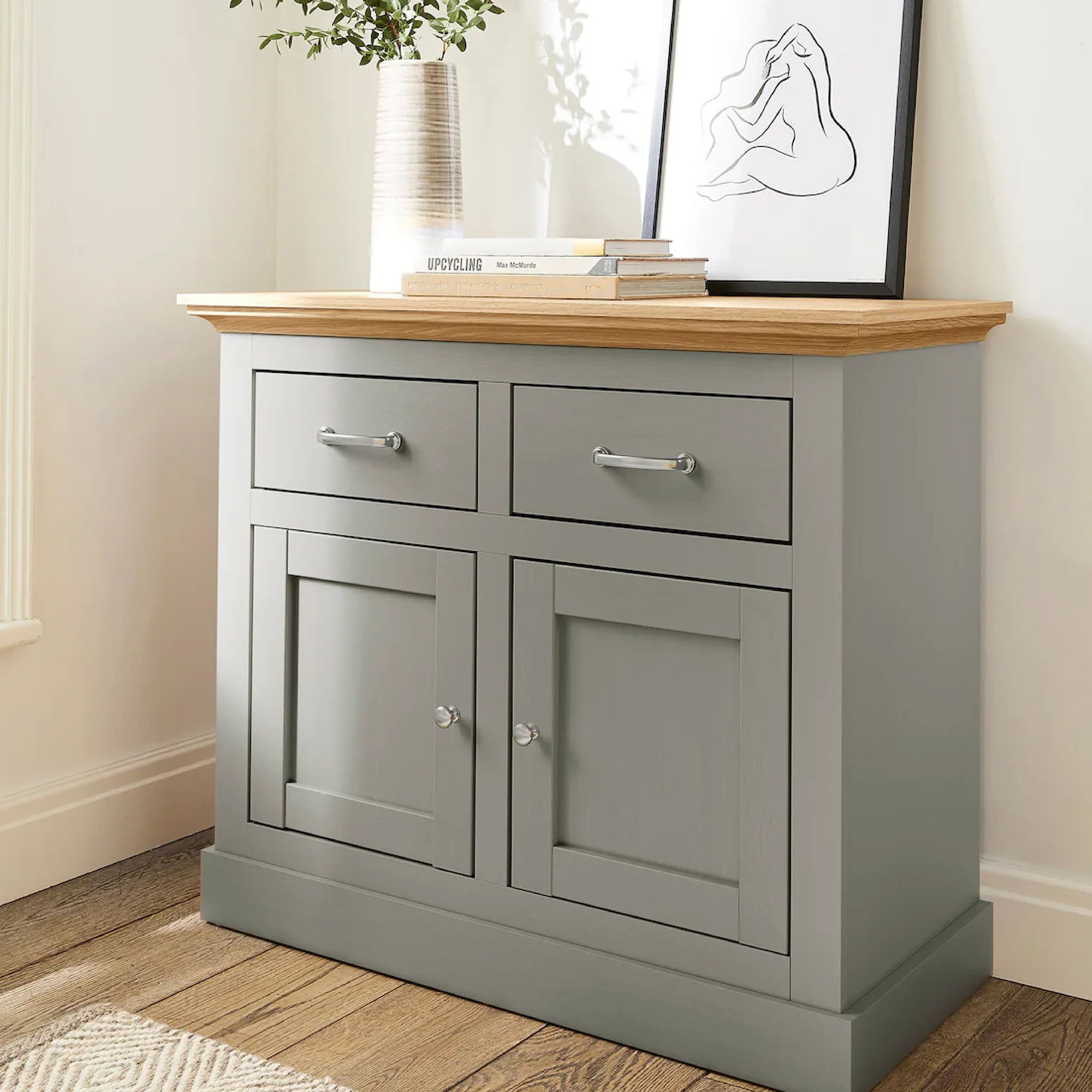 A grey wooden sideboard cupboard