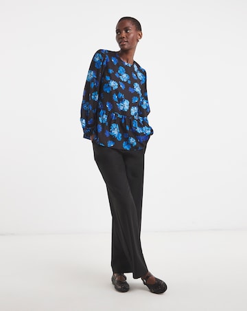 Printed Long Sleeve Peplum Top