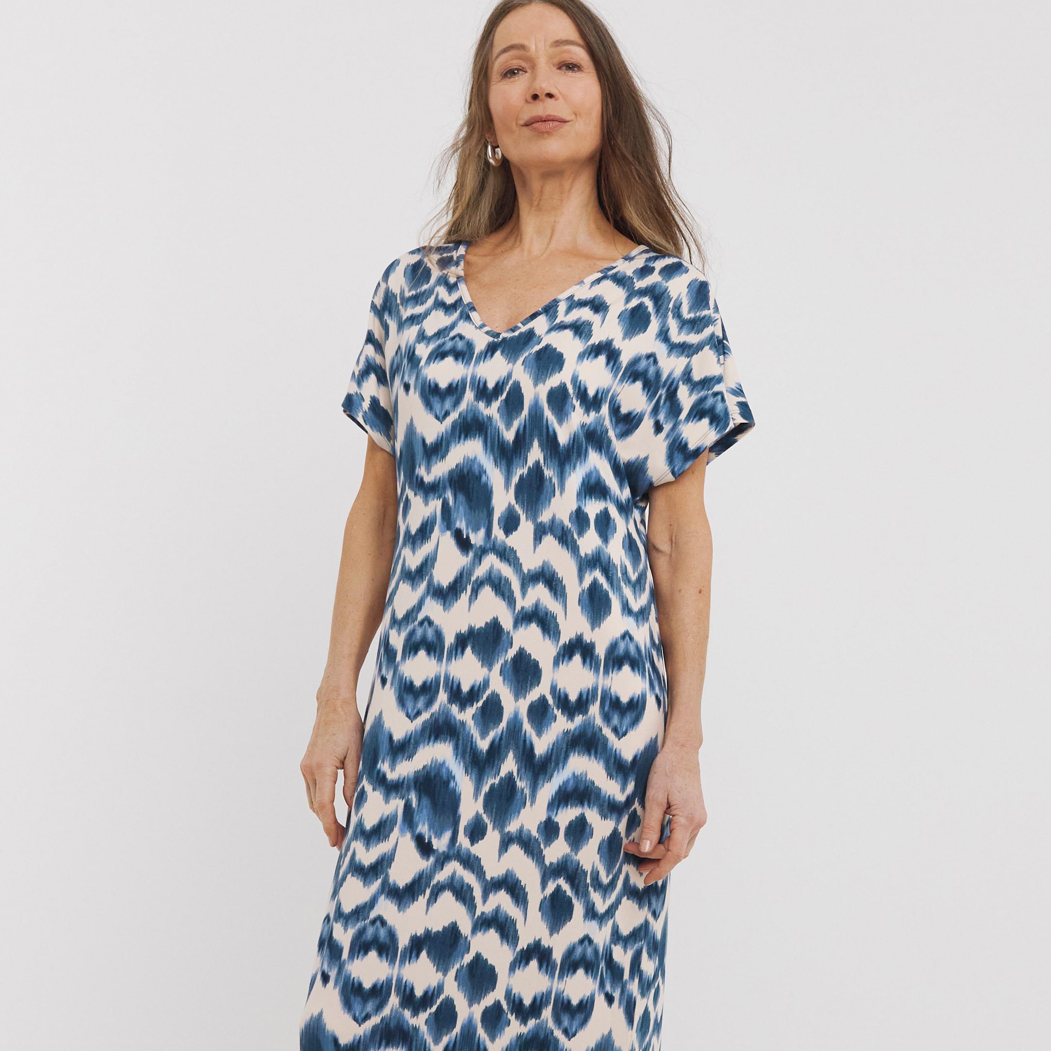 woman in short sleeve maxi dress