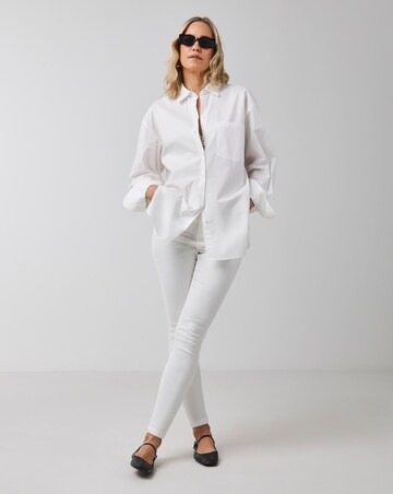 White 24/7 Skinny Jeans