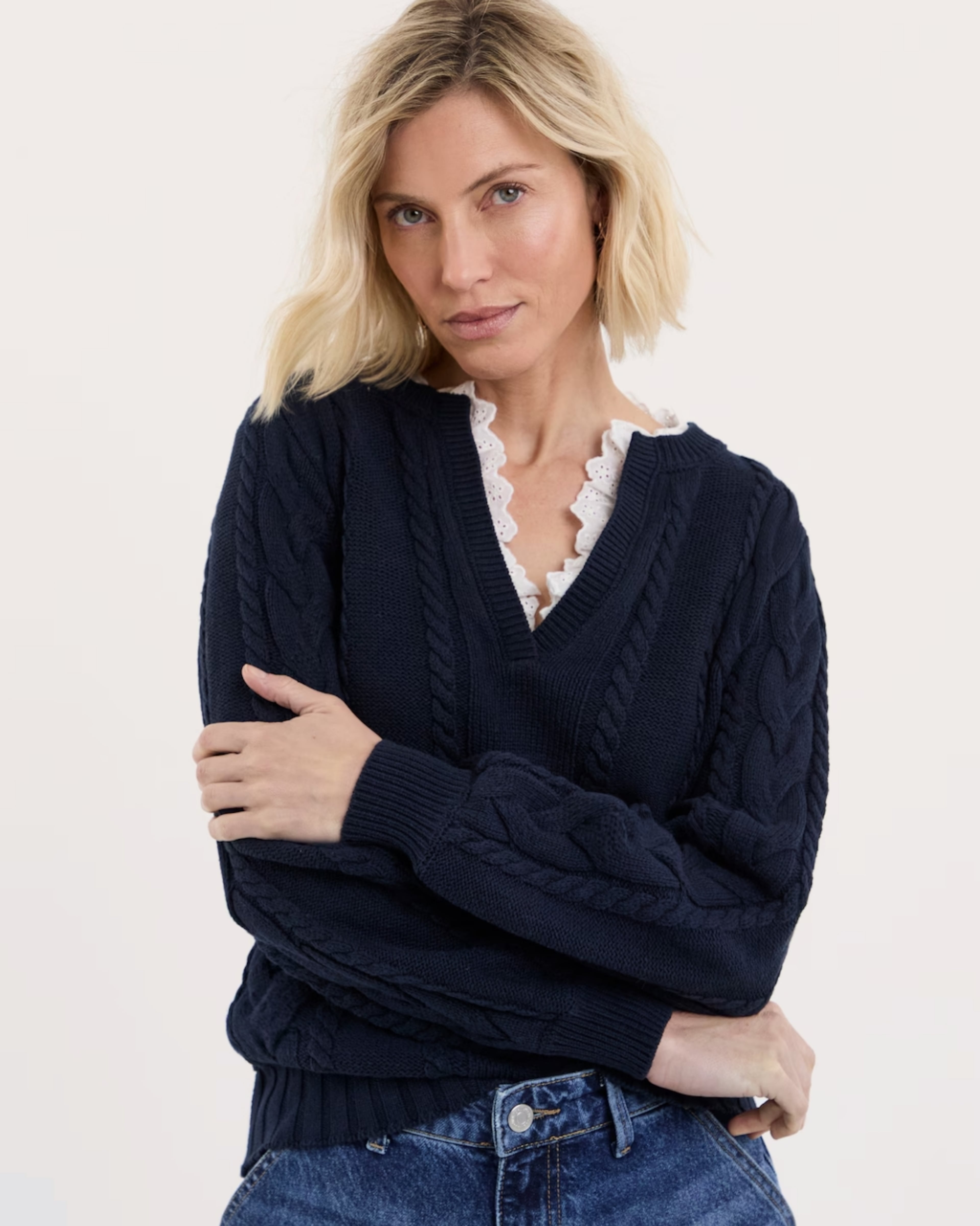 Woman wearing a navy blue blouse