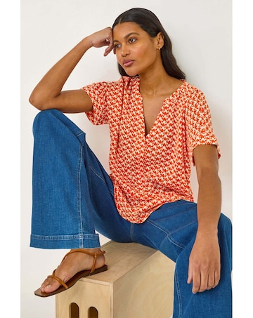 Roman Abstract Print Tunic Top