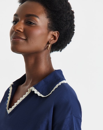 CONTRAST LACE TRIM POLO