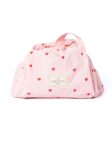The Flat Lay Co.Marshmallow Drawstring Makeup Bag in Pink Hearts