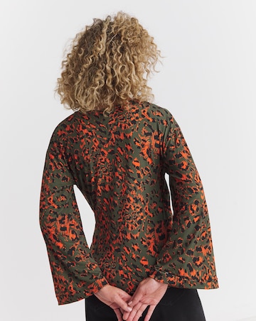 Flared Sleeve Wrap Top